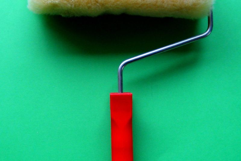 Paint roller in use